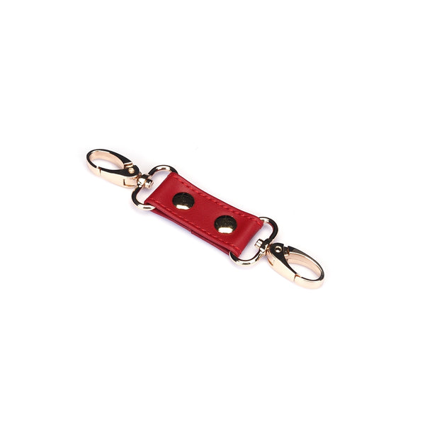 Red Faux Leather Ankle Cuffs by Liebe Seele